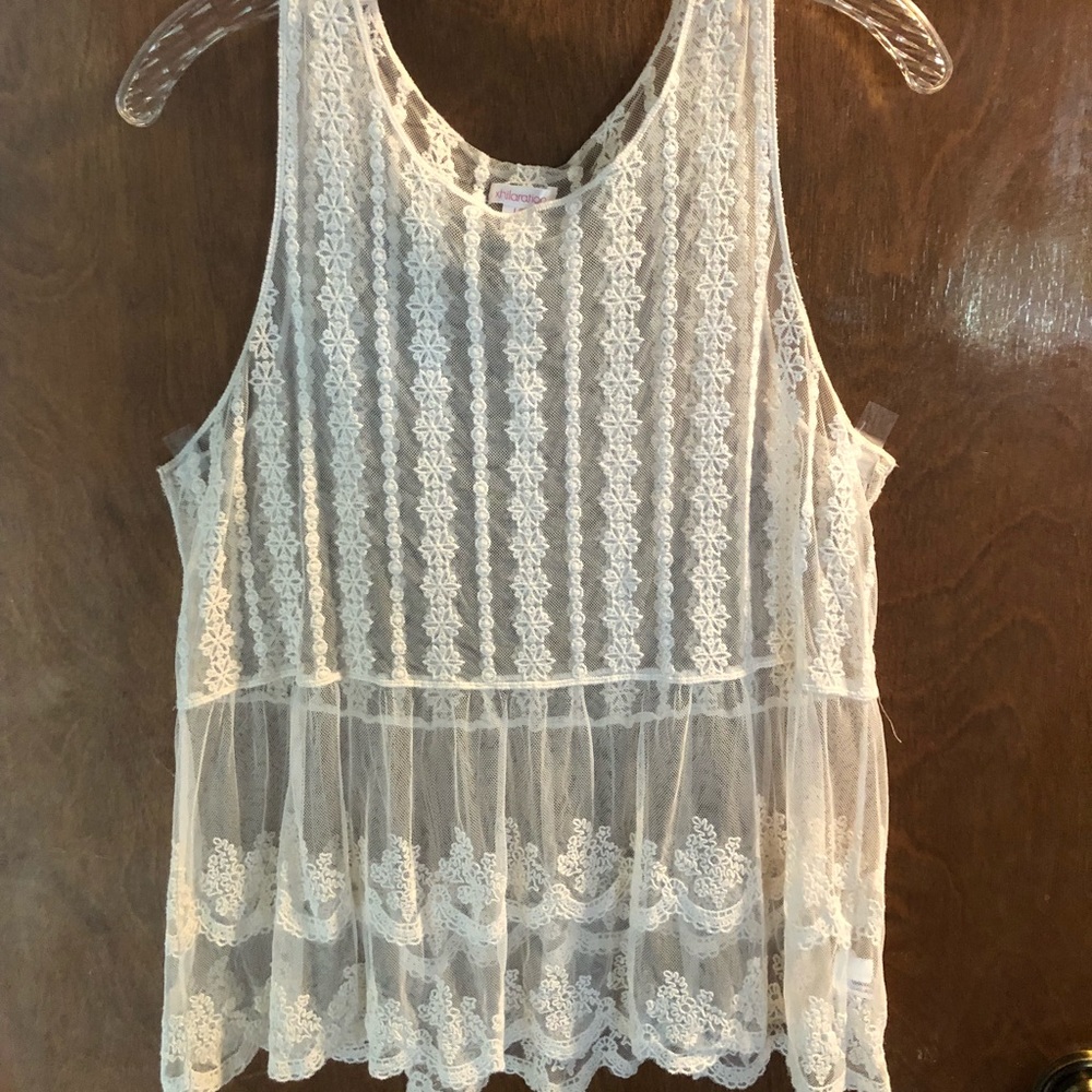 White sheer design embroidered tank top.